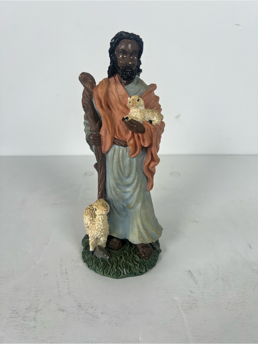Hand-Painted Shepherd Figurine in Blue and Rust